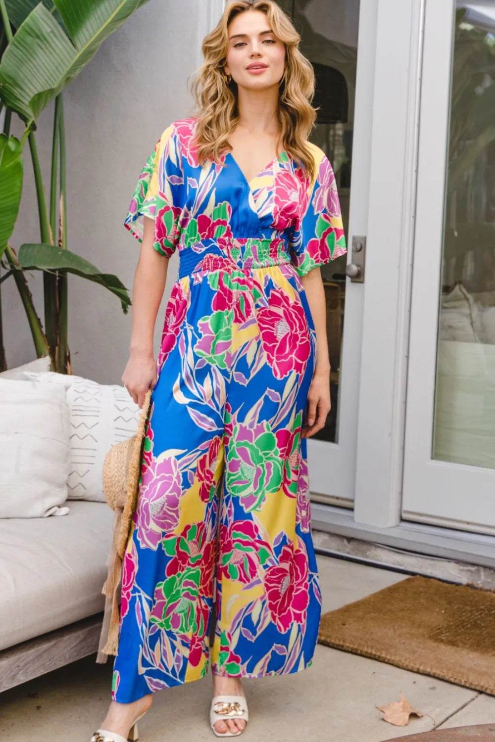 ODDI Full Size Floral Smocked Tied Back Jumpsuit - ELY VESSA LLC