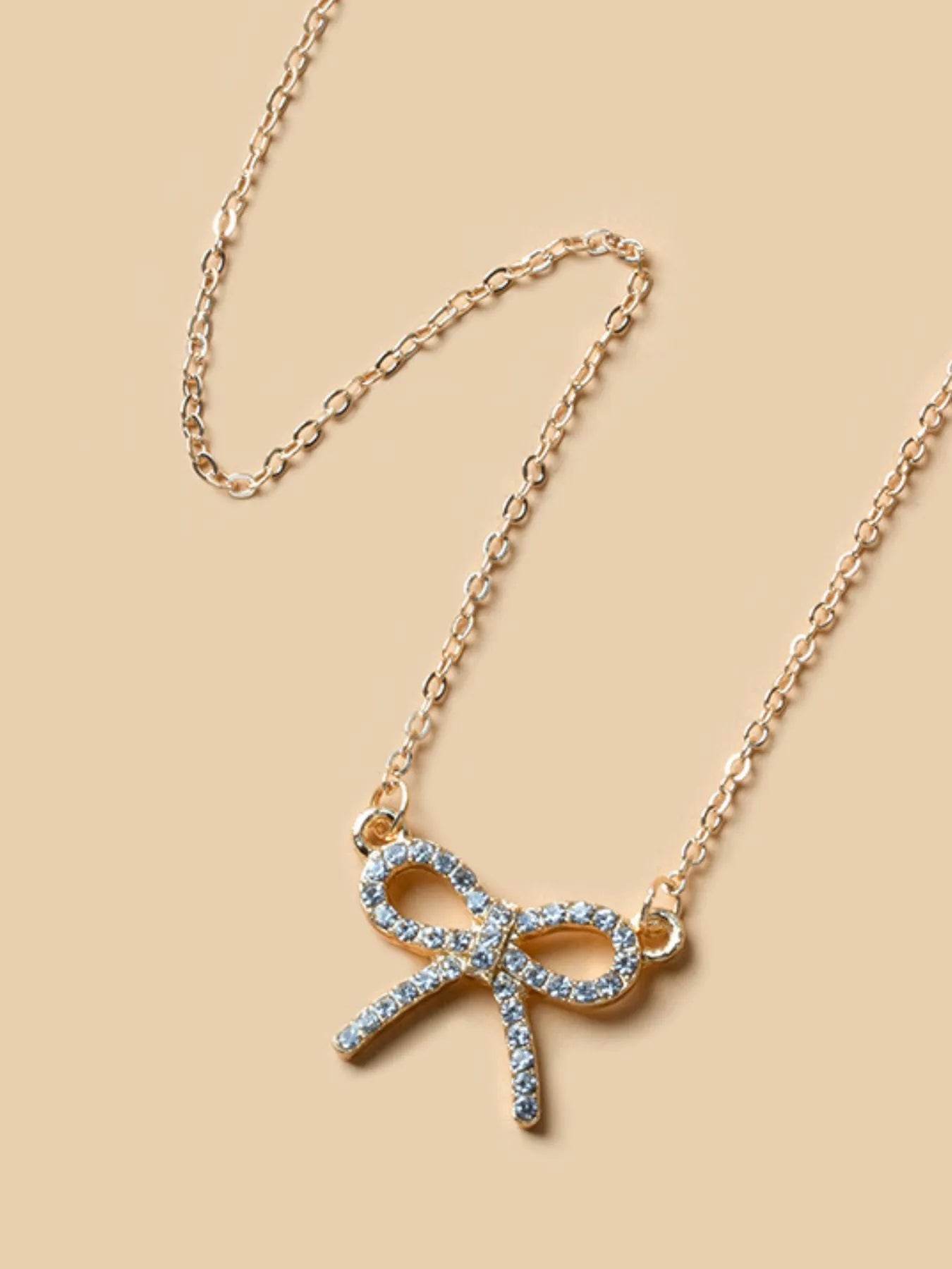 Zircon Bow Pendant Necklace - ELY VESSA LLC
