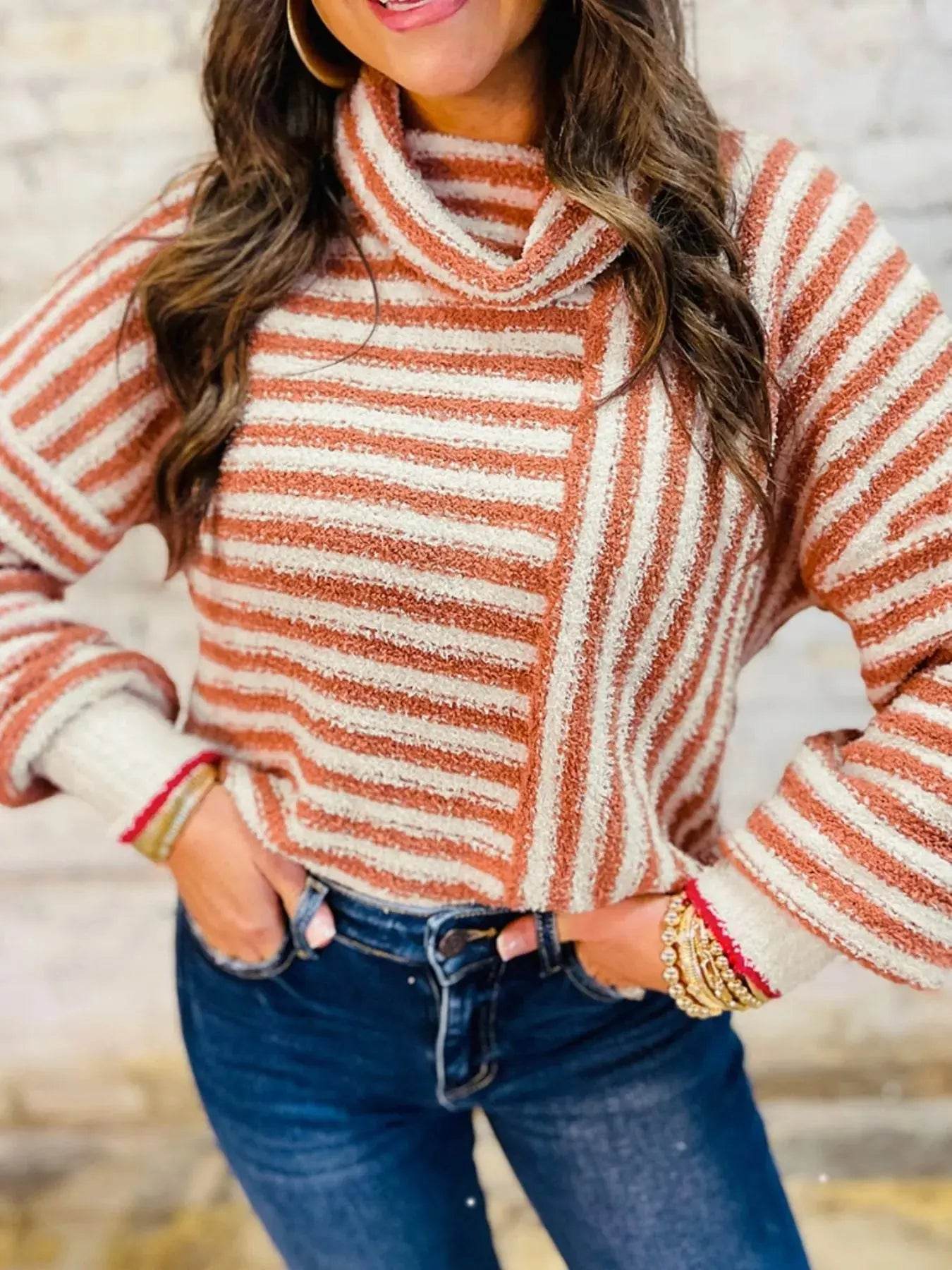 Striped cowl neck long sleeve sweater.