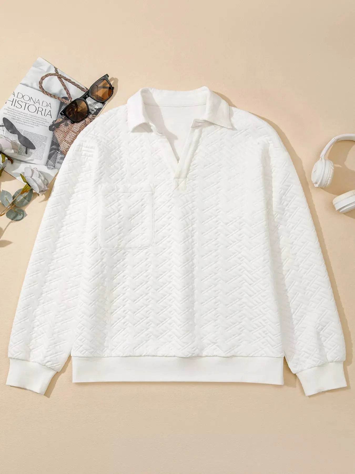 White textured Johnny collar sweatshirt with a chest pocket.