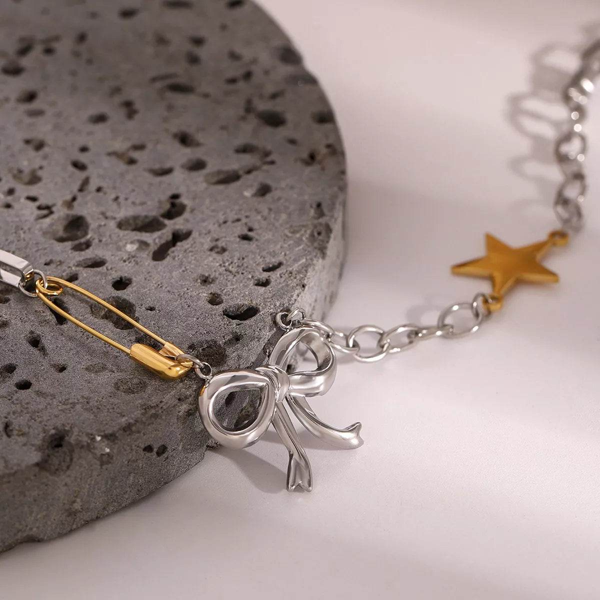 Two-Tone Bow Star Necklace - ELY VESSA LLC