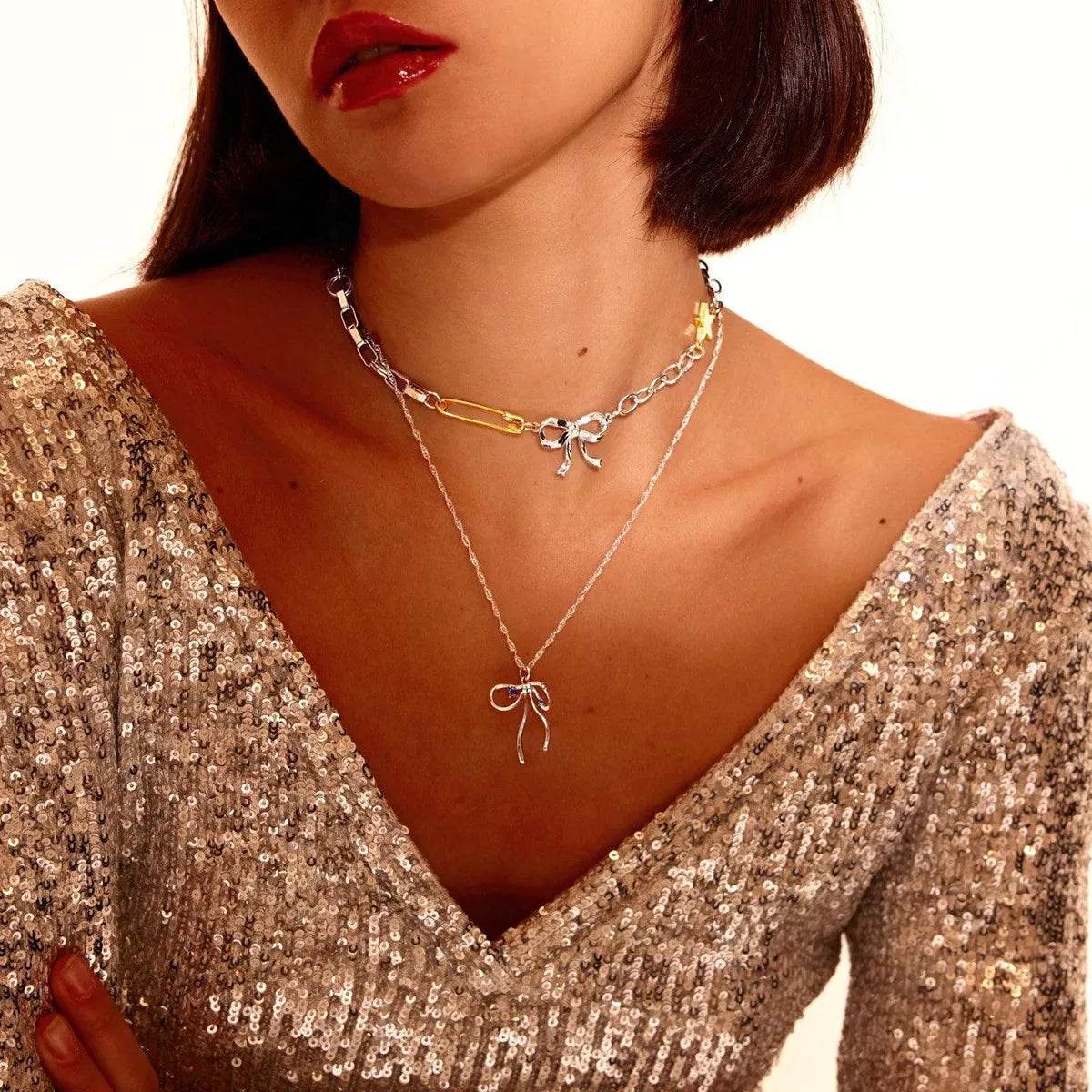 Two-Tone Bow Star Necklace - ELY VESSA LLC