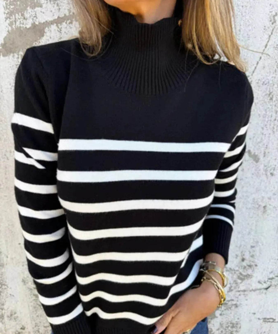 Black and white striped turtleneck sweater.