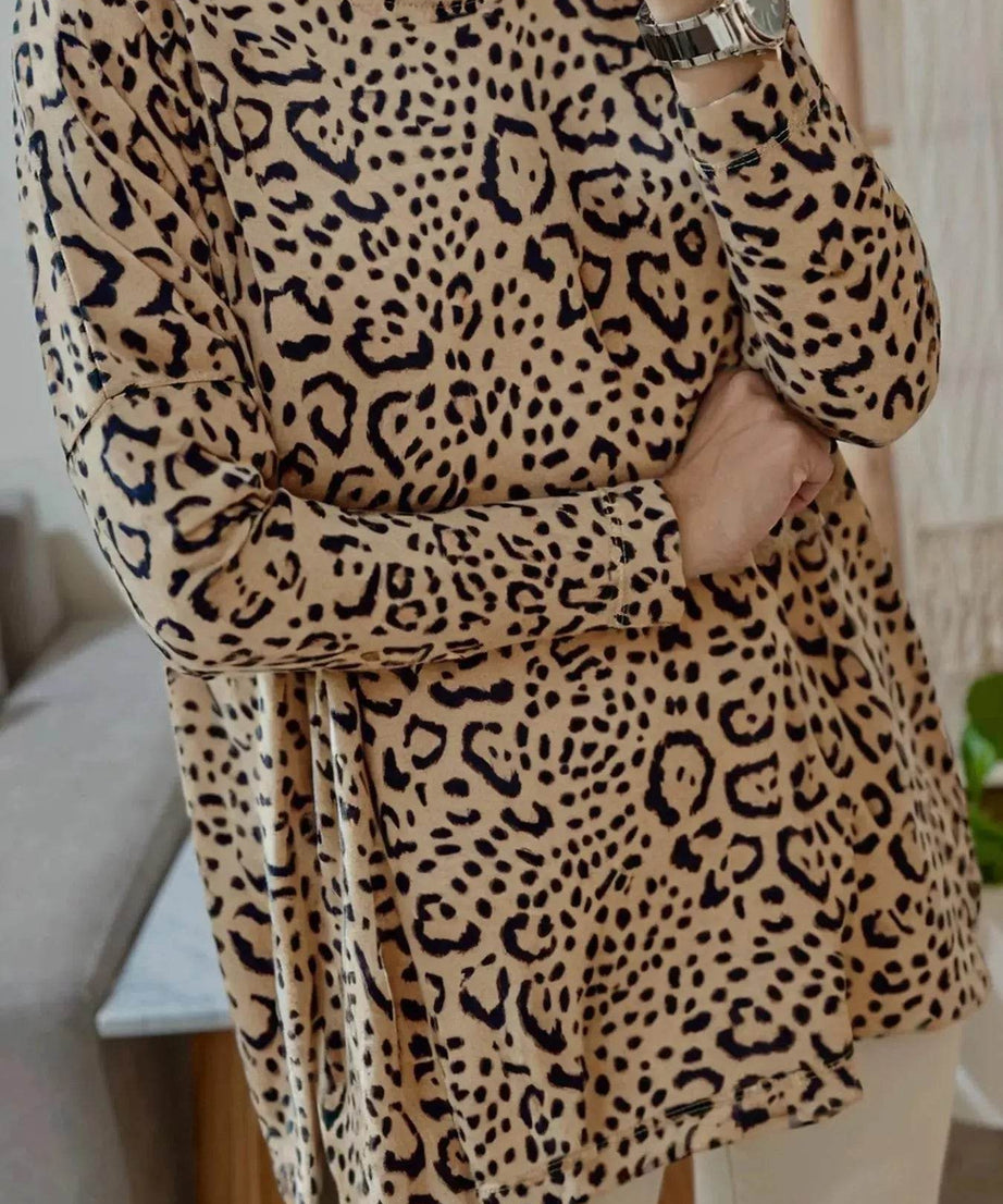 Women's leopard print long sleeve t-shirt with a round neckline.