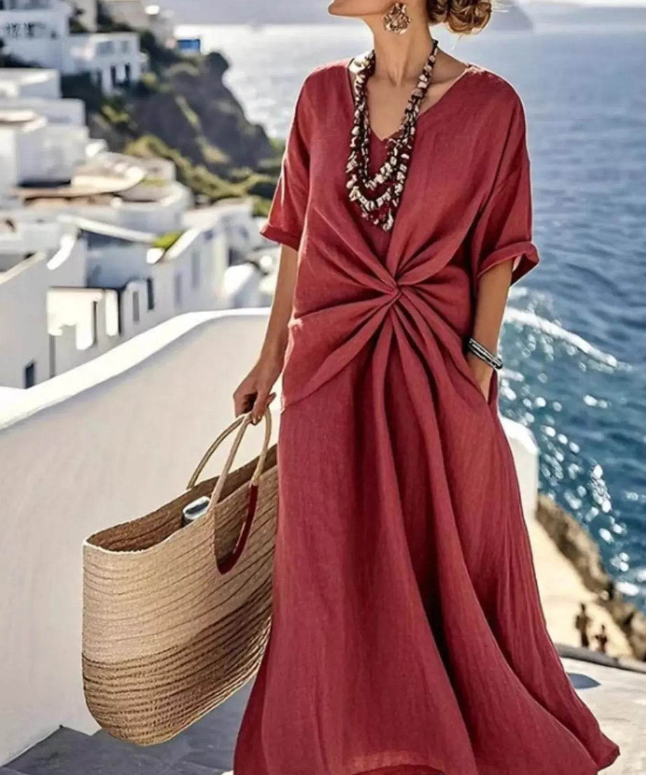 Twist front V-neck half sleeve maxi dress in a deep red color.